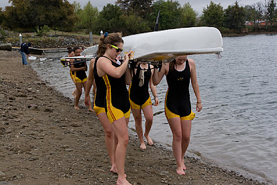Women carry boat