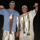 Me and Scott with our catch from a 2 hour wade before dark