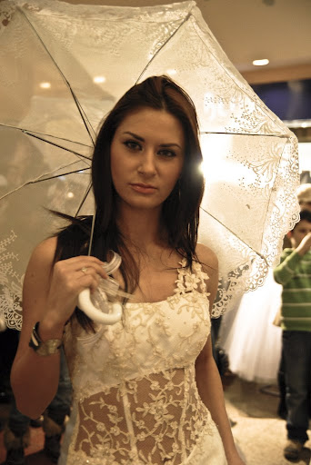 bride ; sexy wedding dress model + umbrella