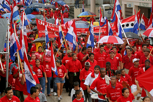 United Democratic Party supporters parade the streets of Orange Walk Town on nomination day 2008.