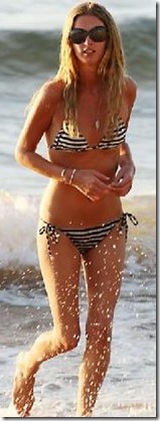 Sister Nicky Hilton frolics in the sea