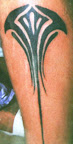 tribal tattoo in thigh 