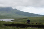 Harvesting peat with Old Man Of Storr in the background