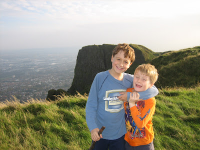 Chance and Paxton on Cave Hill, with McArt's Fort behind them