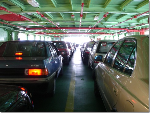 Cars parked on the upper floor of the ferry