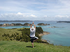 Tree yoga pose near cliff in New Zealand - Photo by Jamie (Garrett) Moore