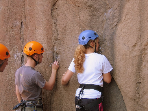 Students checking climbing protection