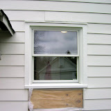 Exterior view of the new pantry window. We got one shorter than the original window, as we added counters in the pantry, and the original window came down too low. (The contractor is coming back to finish the siding).