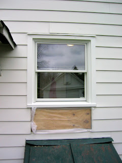 Exterior view of the new pantry window. We got one shorter than the original window, as we added counters in the pantry, and the original window came down too low. (The contractor is coming back to finish the siding).
