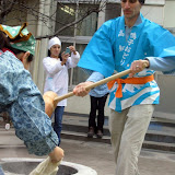 Mike tries mochi pounding