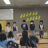 The birthday party at Kai's school for all the kids with March Birthdays (Kai is on the far right). The musical notes behind them read O-tanjoobi Omedetoo (Happy Birthday, with an honorific â€œOâ€)