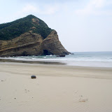 Another beautiful beach all to ourselves on Tanegashima (except for a few surfers). This is the â€œanimal rockâ€ beach. Viewed from a different angle, this rock is supposed to look like an elephant.