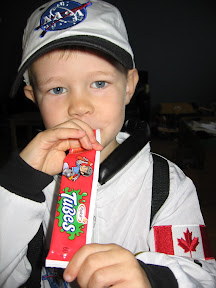 BigE with his halloween costume and a yogurt tube