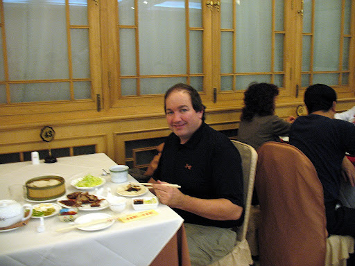 Scott eating Beijing Duck at Quanjude Restaurant in the Qianmen district of Beijing