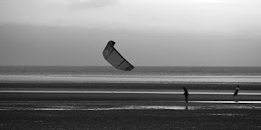 it's kite-surfing, but without the wheels. got air?