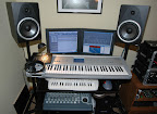 Up close & personal with the former studio desk (mid-2005) ... Top to bottom: M-Audio BX8 monitors, Alesis SR-18 drum machine, Carvin HM40 headphones, Korg Triton workstation, Creative ProdiKeys keyboard, Cakewalk/Peavey StudioMix console