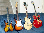 My other electrics as of Dec 2000... L to R: Steinberger GM7-T, Fender American Stratocaster Plus, Gibson Les Paul KM Kalamazoo, Ibanez AS120-TR Artstar