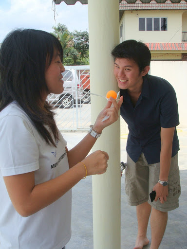 Sim Mei and ping pong balls