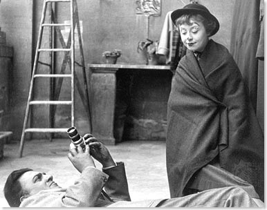 Giulietta Masina being photographed by Federico Fellini on the set of La Strada (1954).