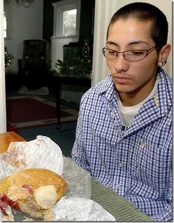 Van Miguel Hartless staring at condomed Burger King sandwich picture